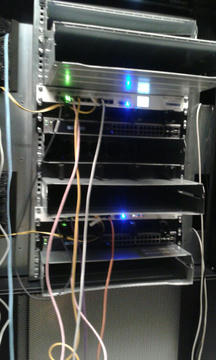 Some servers and network equipment in a rack.